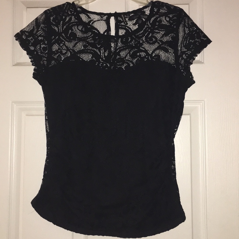 Shirt with mesh overlay